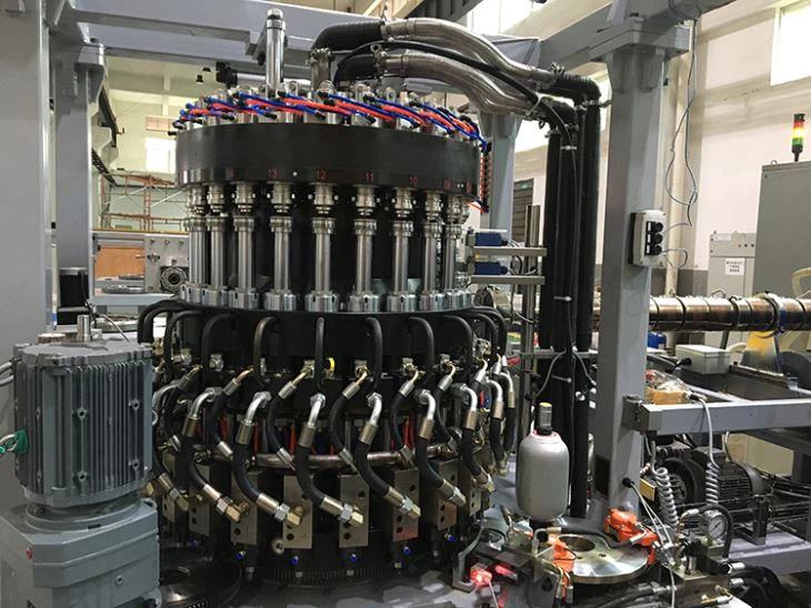 Màquina de compressió de tapes de refrescos